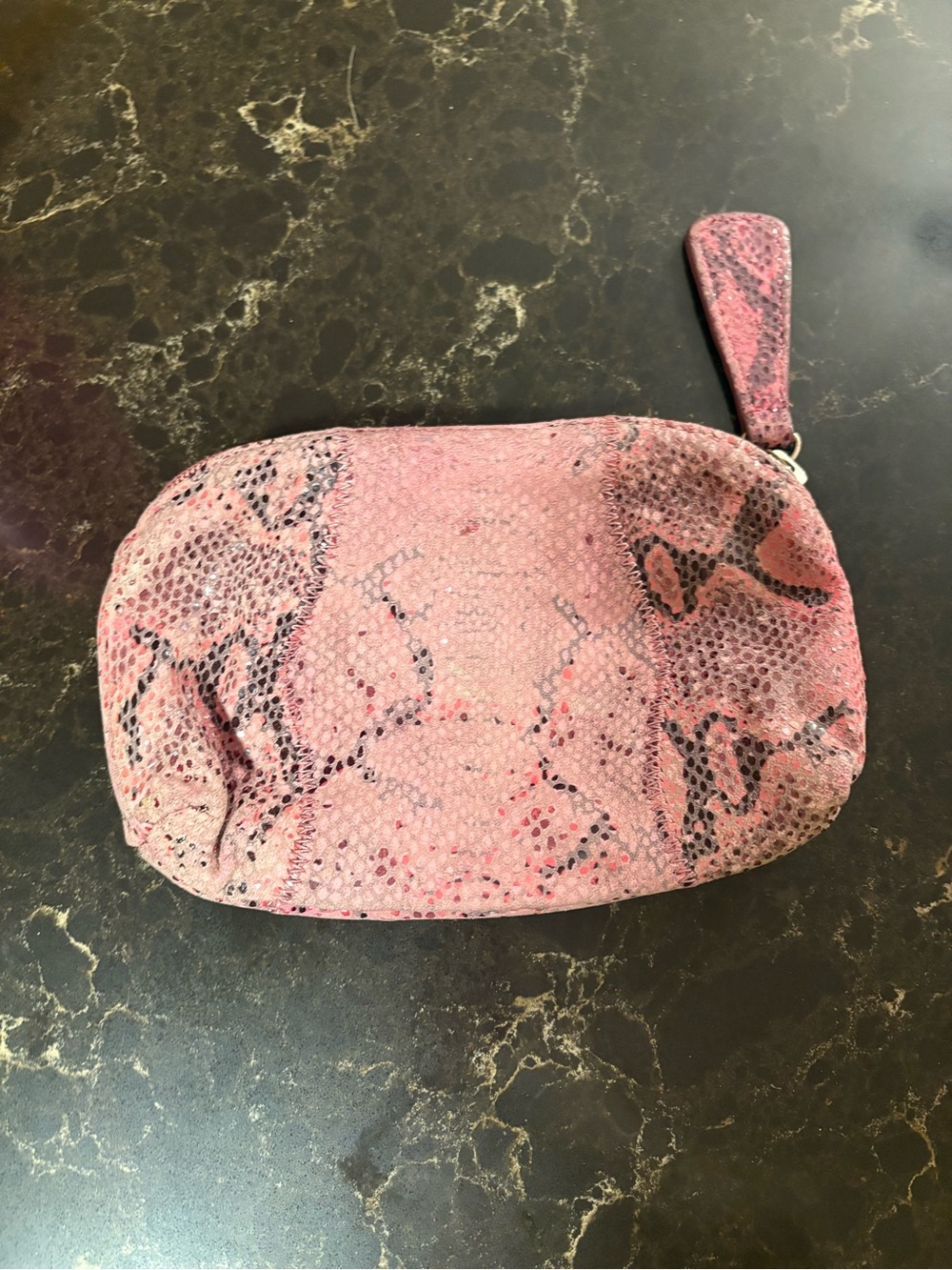 Pink snakeskin wallet by Carlos falchi